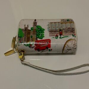 Elegant White and Gold Wristlet with Cityscape Design